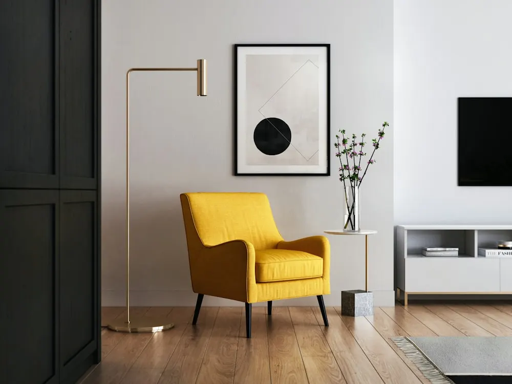 Staged living room, cushions arranged and surfaces clear